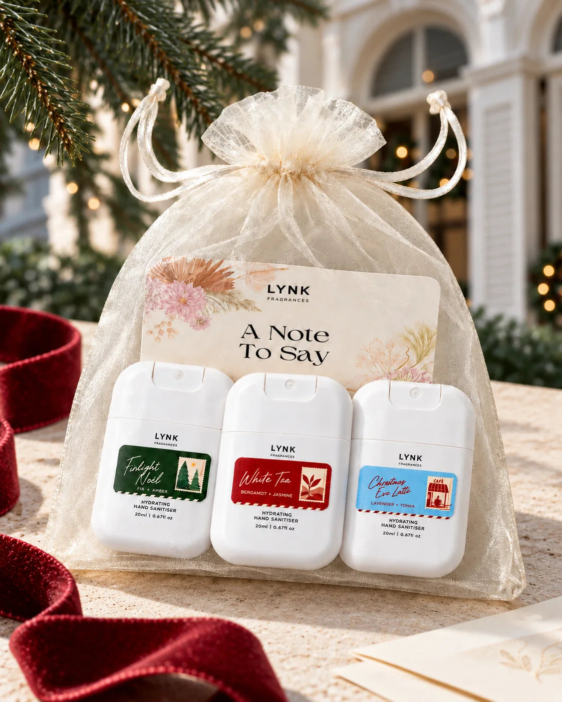 3 Christmas hand sanitisers, one of each scent
1 organza bag
1 greeting card