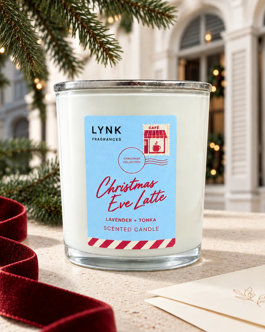 Christmas Eve Latte scented candle in a festive Christmas still life