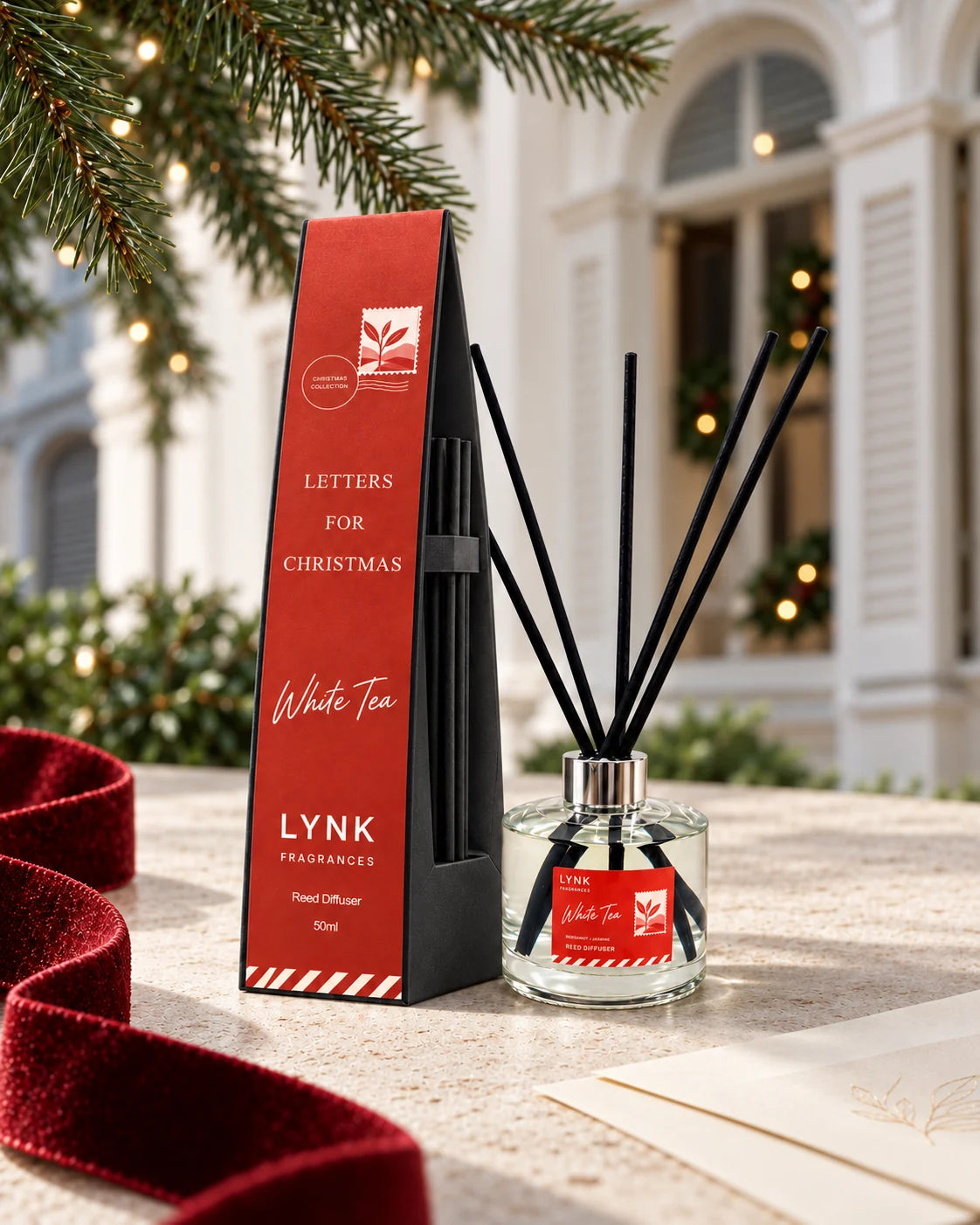 White Tea reed diffuser in a festive Christmas still life